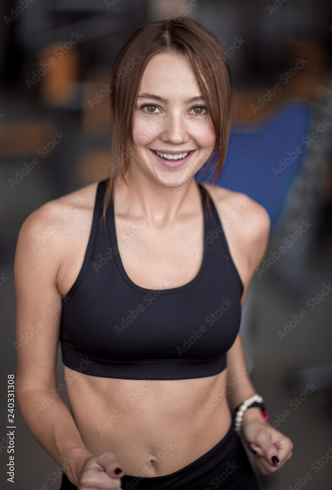 close up.portrait of an attractive woman in the gym close up.portrait of an attractive woman in the gym