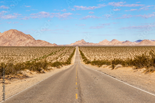 A long, straight road through the Californian desert