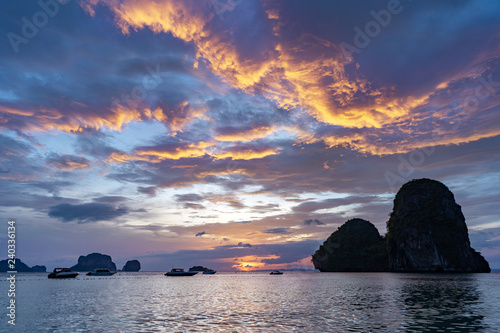 Beautiful sea sunset cloudy sky Thailand Railay