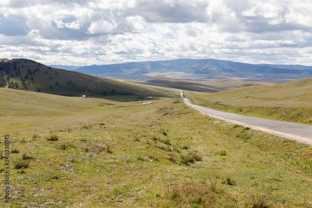 asphalt road Darkhan-Ulaanbaatar in Mongolia, beautiful Mongolian landscape