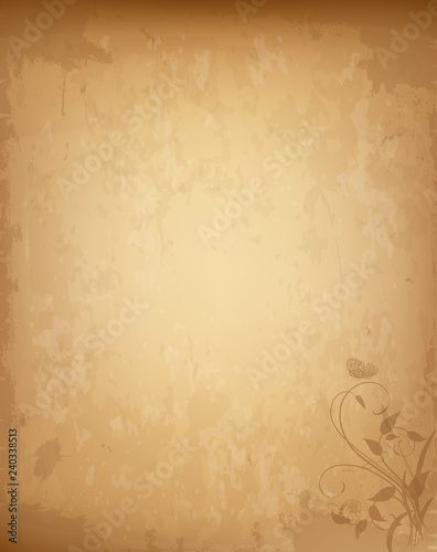 Old grungy vintage paper with lovely floral print in corner.