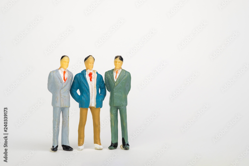 Group of figure miniature businessman or small people investor and office worker secretary on white background for money and financial business teamwork concept. Group of figure miniature businessman or small people investor and office worker secretary on white background for money and financial business teamwork concept.
