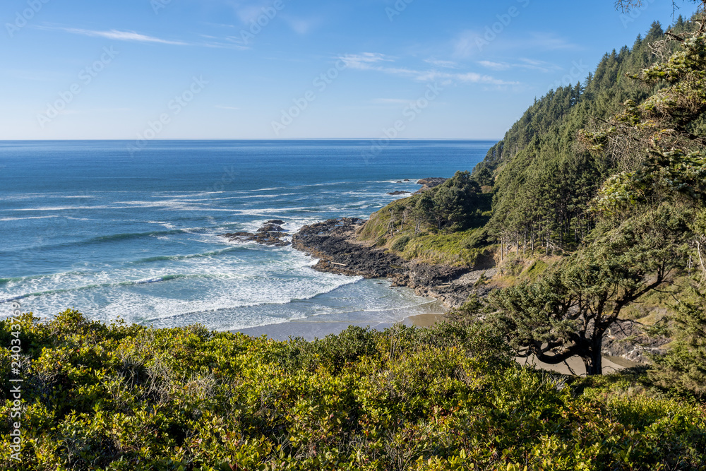 The beach and the coastline from a curve of Highway 101 off the coast of Oregon