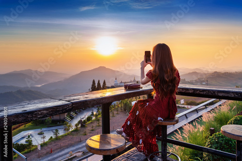 Tourist take a photo at Wat Phra That Pha Son Kaew Temple in Khao Kho Phetchabun, Thailand.