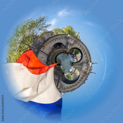 Little planet view of Cruising on a peniche boat in Paris in spring, with a bridge and french flag in the foreground
