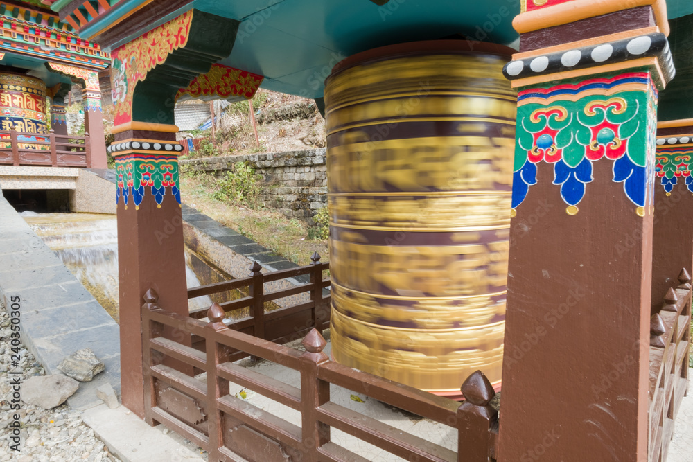 spinning buddhist prayer wheel