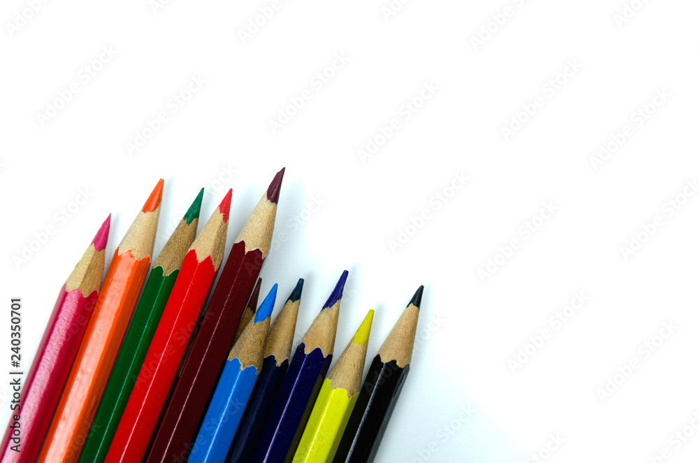 Multi colored pencils on white background Multi colored pencils on white background