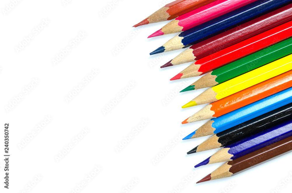 Multi colored pencils on white background Multi colored pencils on white background