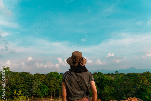 Wallpaper Mural Woman rise hands up to sky freedom concept with blue sky and summer field background. Torontodigital.ca