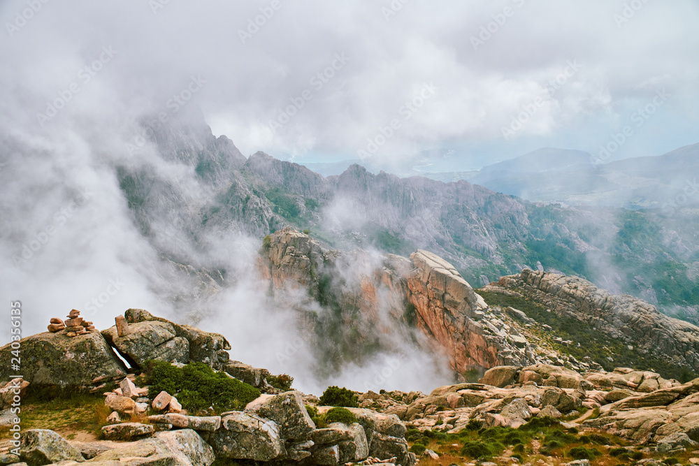 Misty abstract mountain landscape in Corsica Corse France