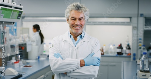 Portrait of smiling male scientist satisfied with great results of completed research in laboratory. Shot in 8K. Concept  research biochemistry  pharmaceutical medicine