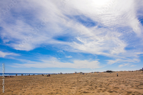 Beautiful view of the Maspalomas Dunes with a cloudy sky, famous beach in Gran Canaria, Spain