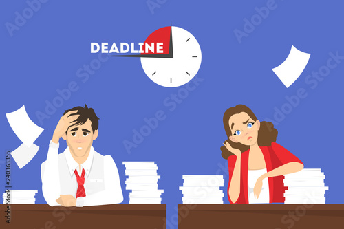 Man at the desk with pile of document