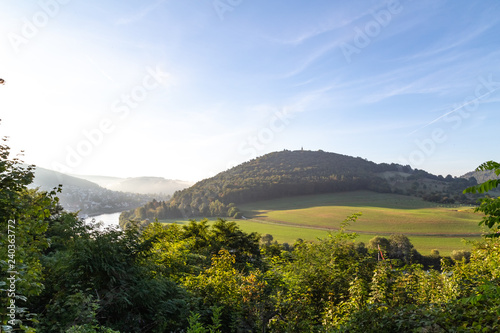 sunrise over the river Neckar and Neckarsteinach with the 4 castles near Heidelberg Germany