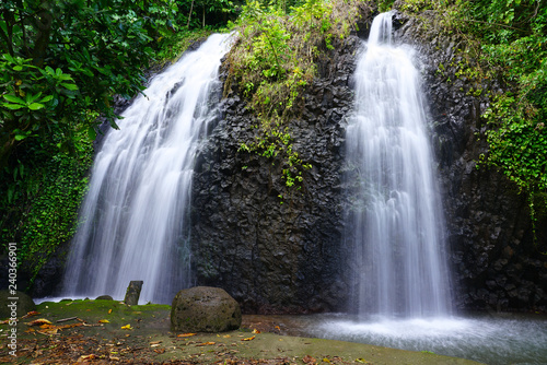 Fototapeta View of a cascading waterfall in Tahiti, French Polynesia