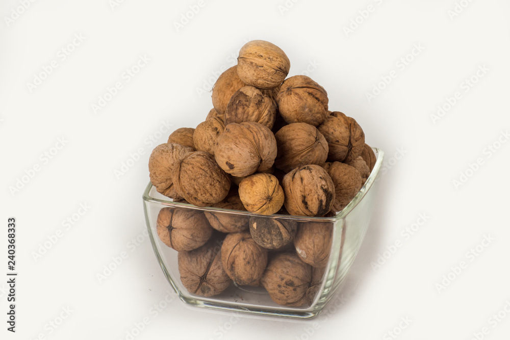 walnuts photographed on a white background close-up walnuts photographed on a white background close-up