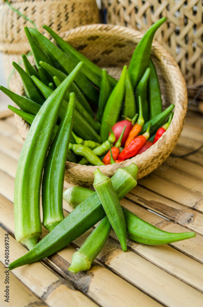 okra in bamboo bastket and chili organic food okra in bamboo bastket and chili organic food