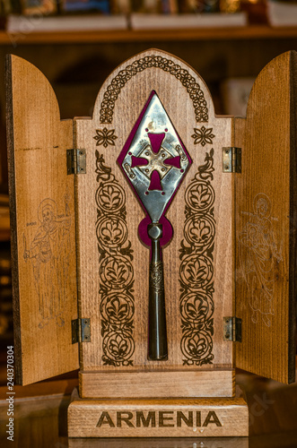 Souvenir copy of the legendary spear Longin in a wooden box with doors, after which the medieval monastery Geghard in Armenia is named.

 photo