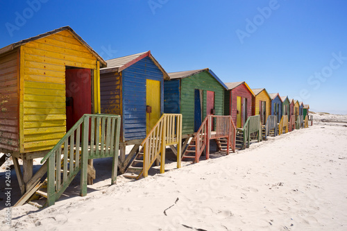 Colourful beach huts on the beach in Muizenberg, South Africa © sara_winter