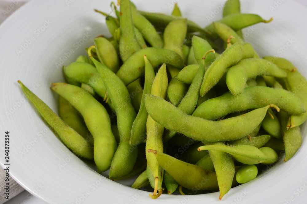 Soy beans in a white bowl