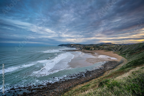 Barinatxe - La Salvaje beach at dawn under the clouds, Basque Country photo