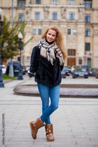 Young beautiful woman in winter coat