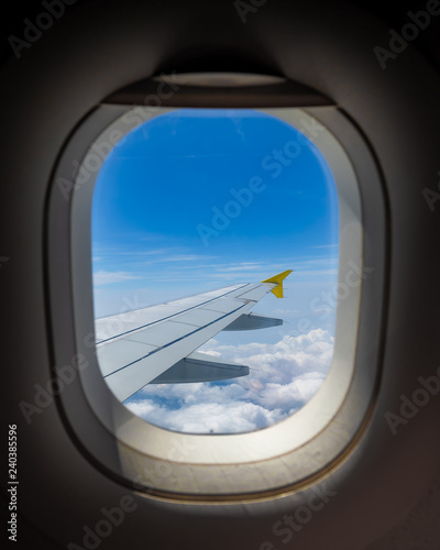 the wing of the aircraft in the window