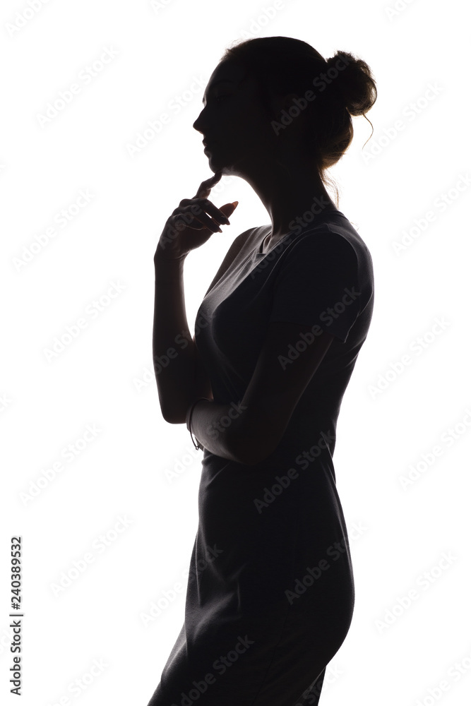 silhouette of a pensive woman with the hand at the chin on a white isolated background, girl make a decision