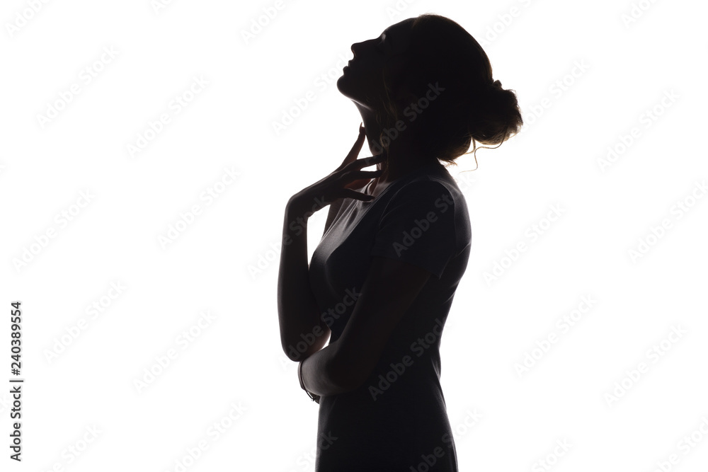 silhouette of beautiful sensual girl, woman face profile on white isolated background, concept of beauty and fashion