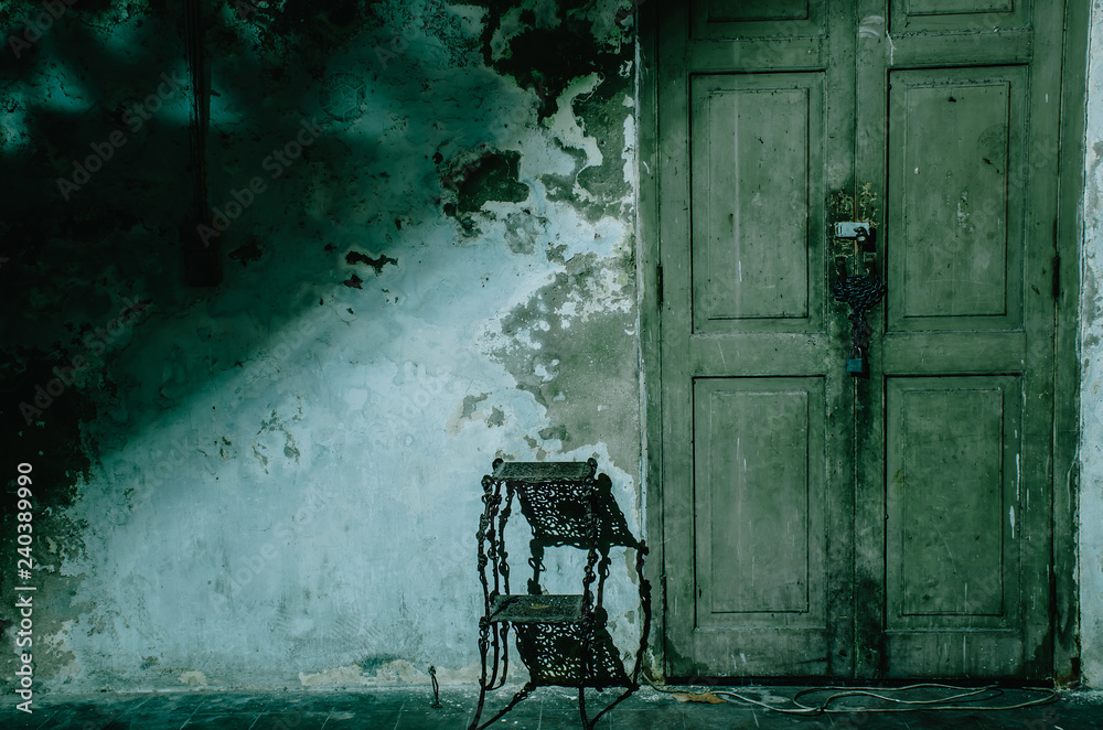 Dark and scary front house entrance door at night, copy space. Stock Photo  | Adobe Stock