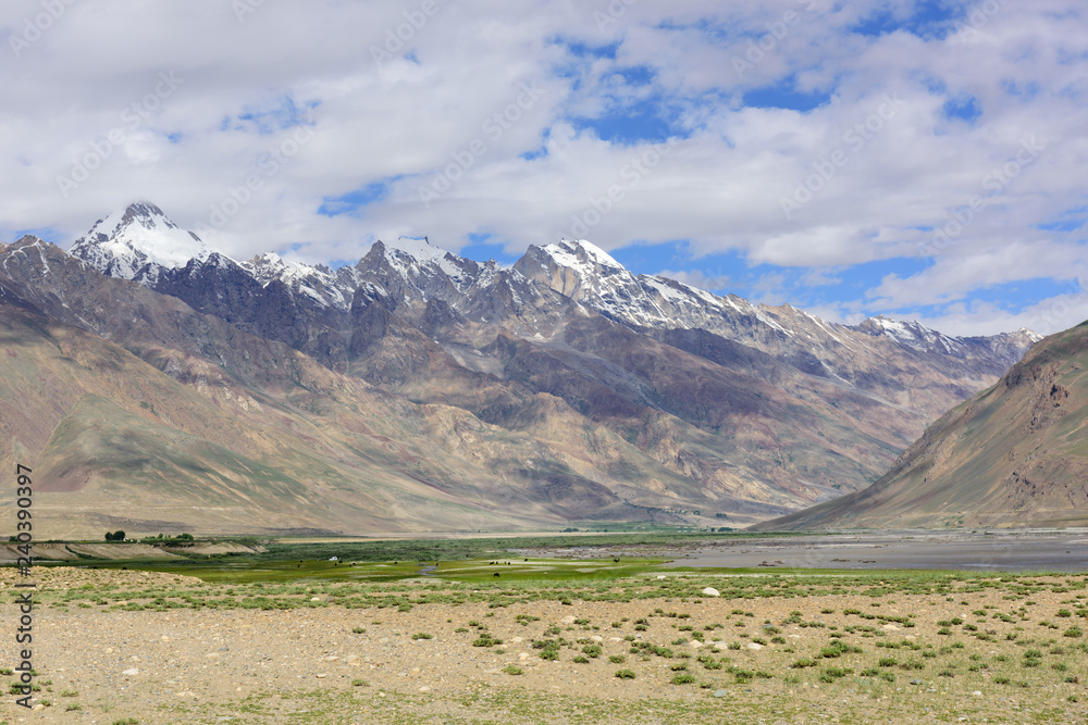 Zanskar landscape view with Himalaya mountains covered with snow and blue sky in Jammu & Kashmir, India,