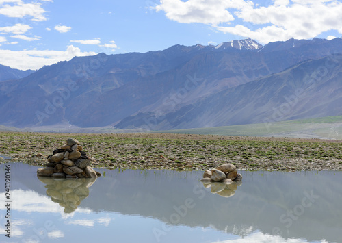 Stones balance with great mountain background,Zanskar,Padum,India