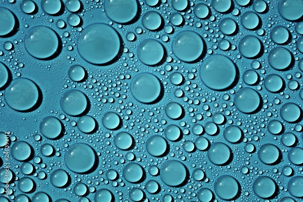 drops water on blue background
