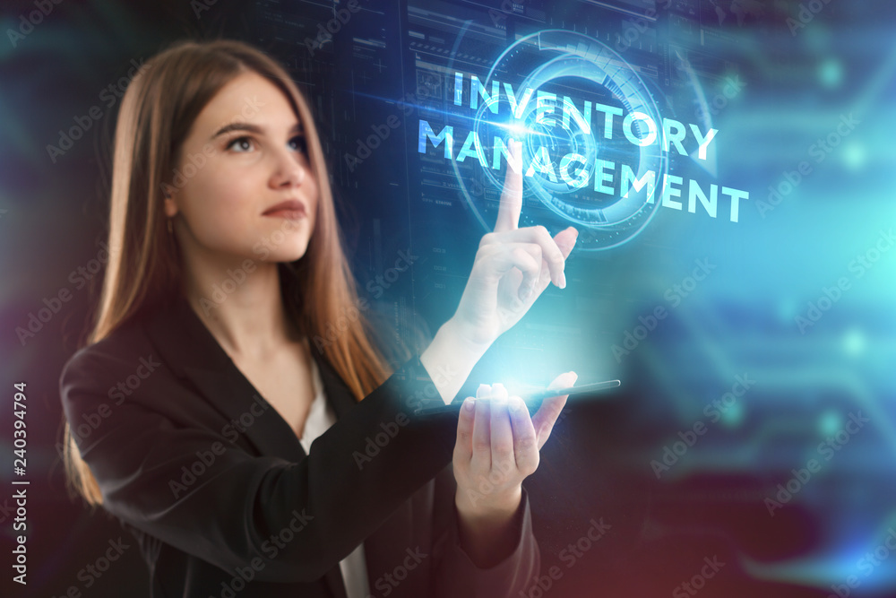 The concept of business, technology, the Internet and the network. A young entrepreneur working on a virtual screen of the future and sees the inscription: Inventory management The concept of business, technology, the Internet and the network. A young entrepreneur working on a virtual screen of the future and sees the inscription: Inventory management