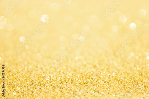 Defocused gold glitter background. Gold abstract bokeh background. Christmas abstract background © Achira22