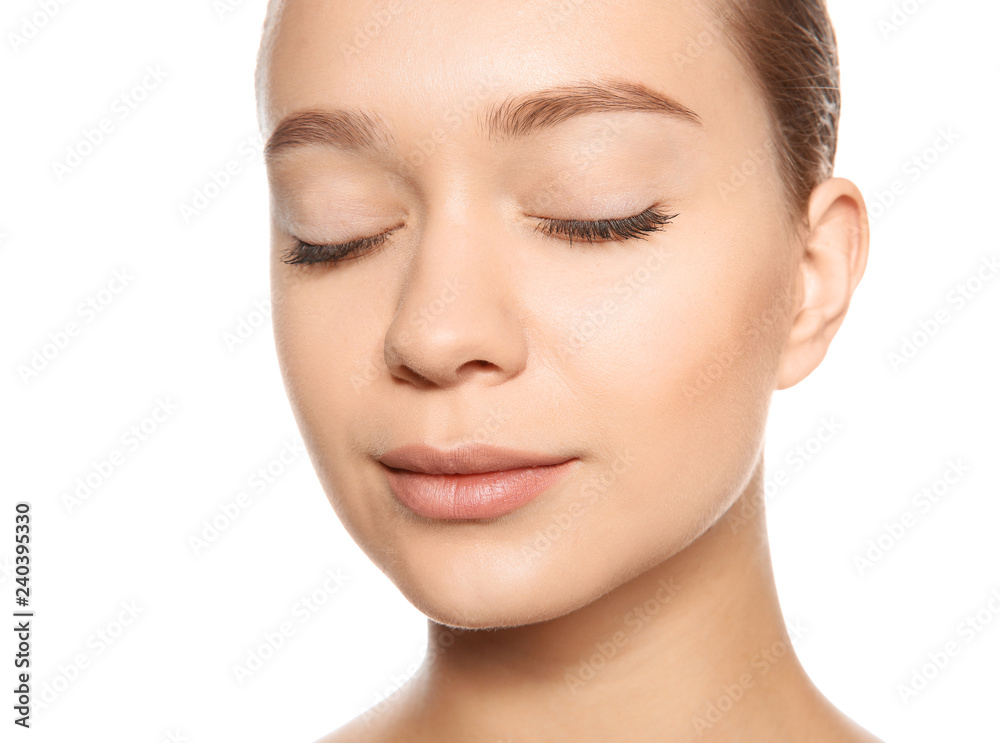 Portrait of young woman with foundation on her face against white background Portrait of young woman with foundation on her face against white background
