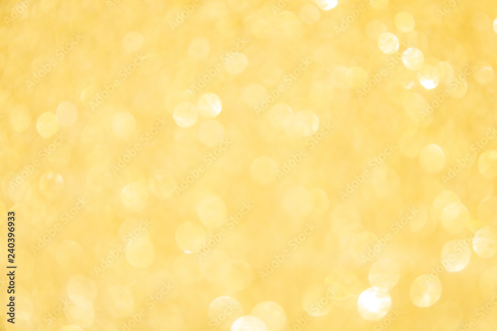 Defocused gold glitter background. Gold abstract bokeh background. Christmas abstract background - obrazy, fototapety, plakaty 