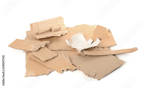 Pieces of torn cardboard on white background. Recyclable material