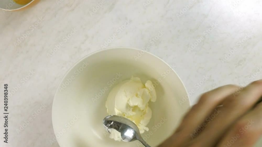 Adding cream cheese in bowl Adding cream cheese in bowl