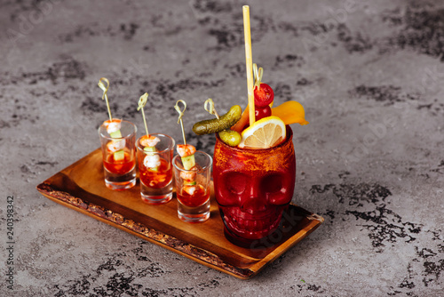 The Zombie cocktail made of fruit juices, liqueurs, and various rums photo