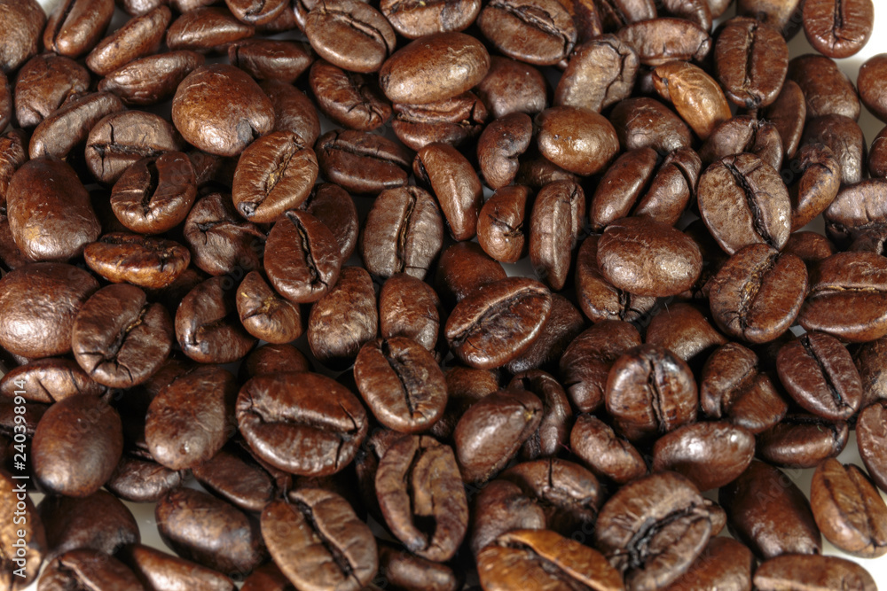 Naklejka premium Well-stocked coffee beans background.