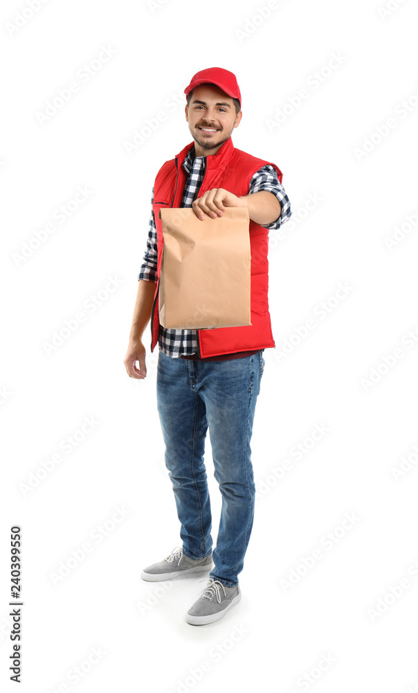 Young courier with paper bag on white background. Food delivery service Young courier with paper bag on white background. Food delivery service