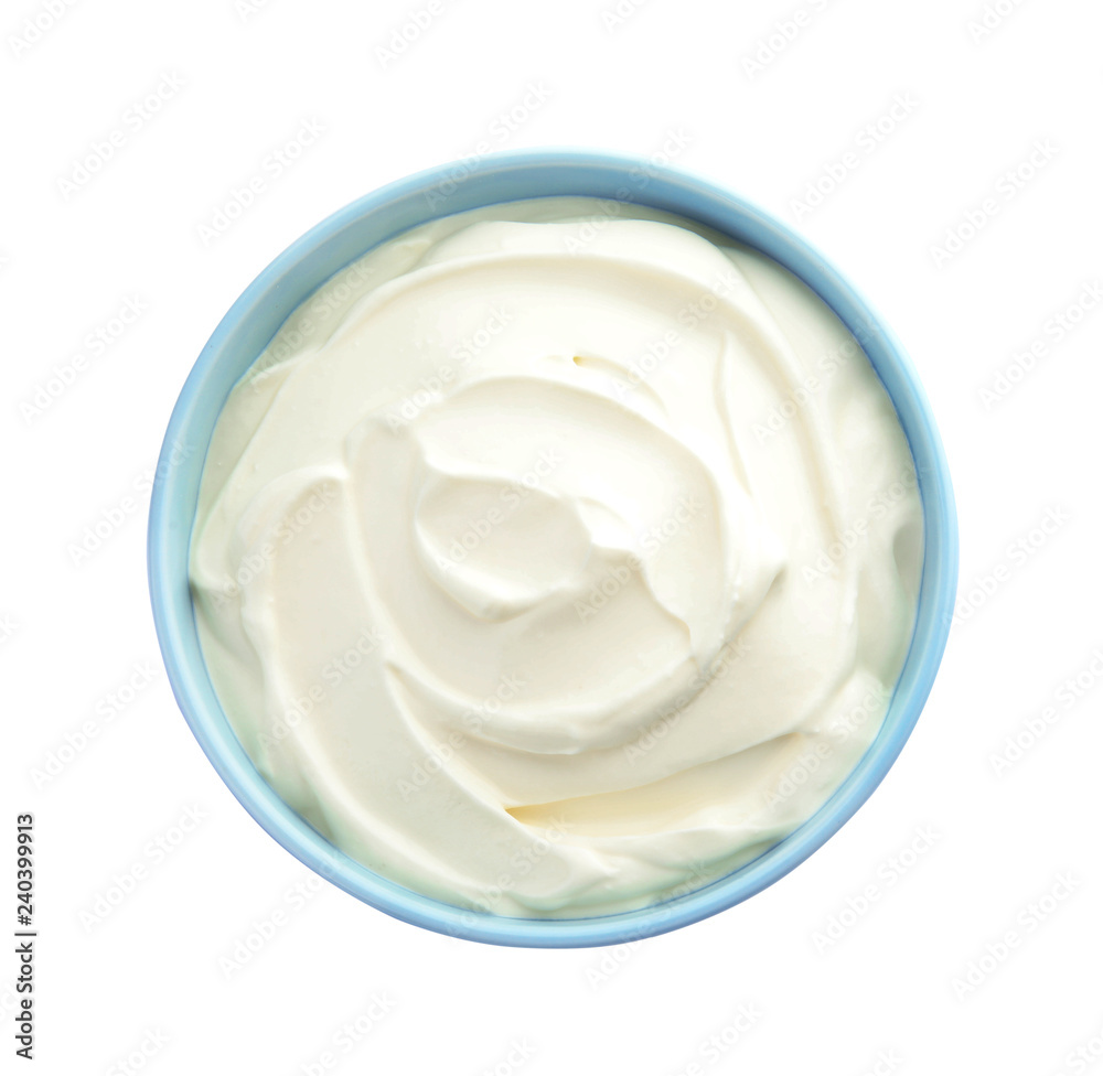 Bowl with sour cream on white background, top view Bowl with sour cream on white background, top view