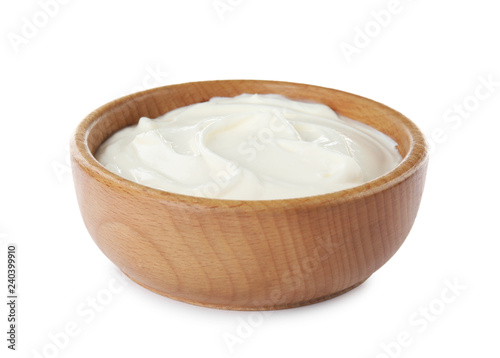 Bowl with sour cream on white background