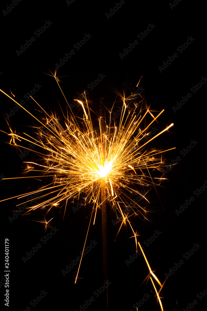 Christmas sparkler isolated on black background. Bengal fire Christmas sparkler isolated on black background. Bengal fire