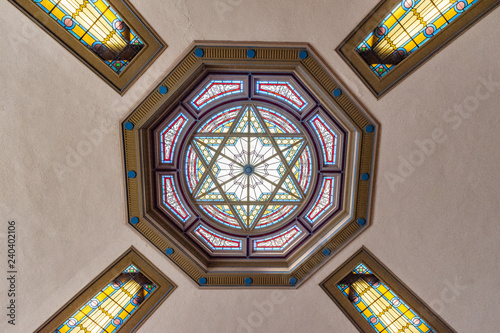 jewish star of david light pattern on the ceiling of a synagogue
