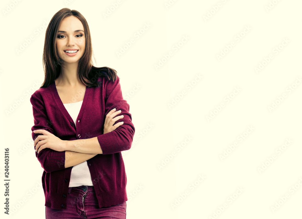 Smiling young woman with crossed arms Smiling young woman with crossed arms