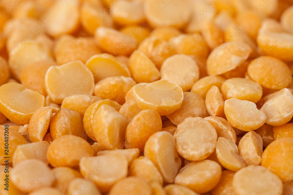 Yellow split mustard seeds for backgrounds or textures, healthy food Yellow split mustard seeds for backgrounds or textures, healthy food