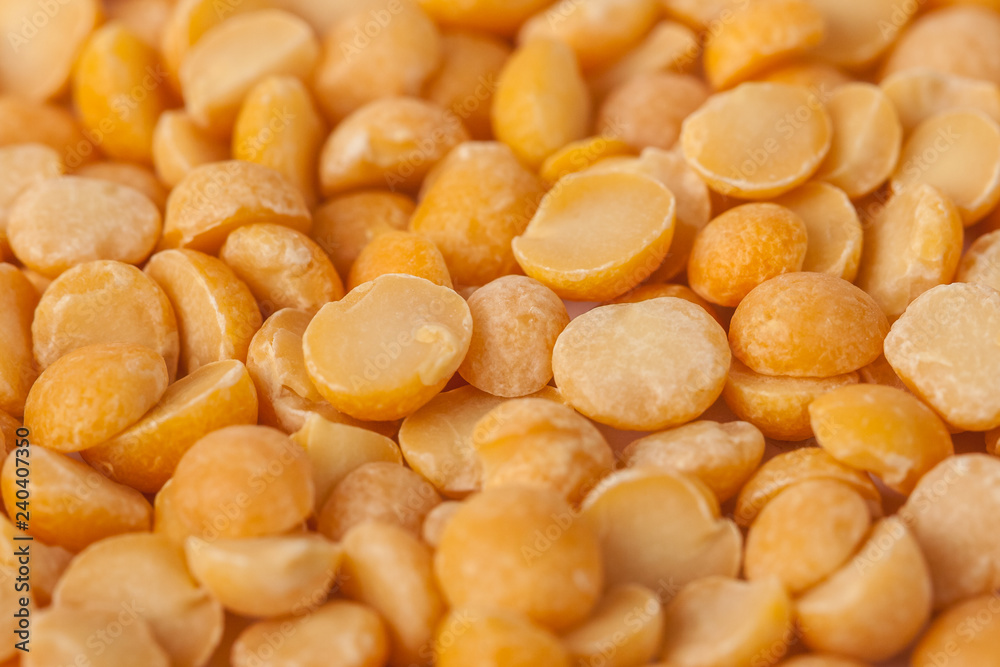 Yellow split mustard seeds for backgrounds or textures, healthy food Yellow split mustard seeds for backgrounds or textures, healthy food
