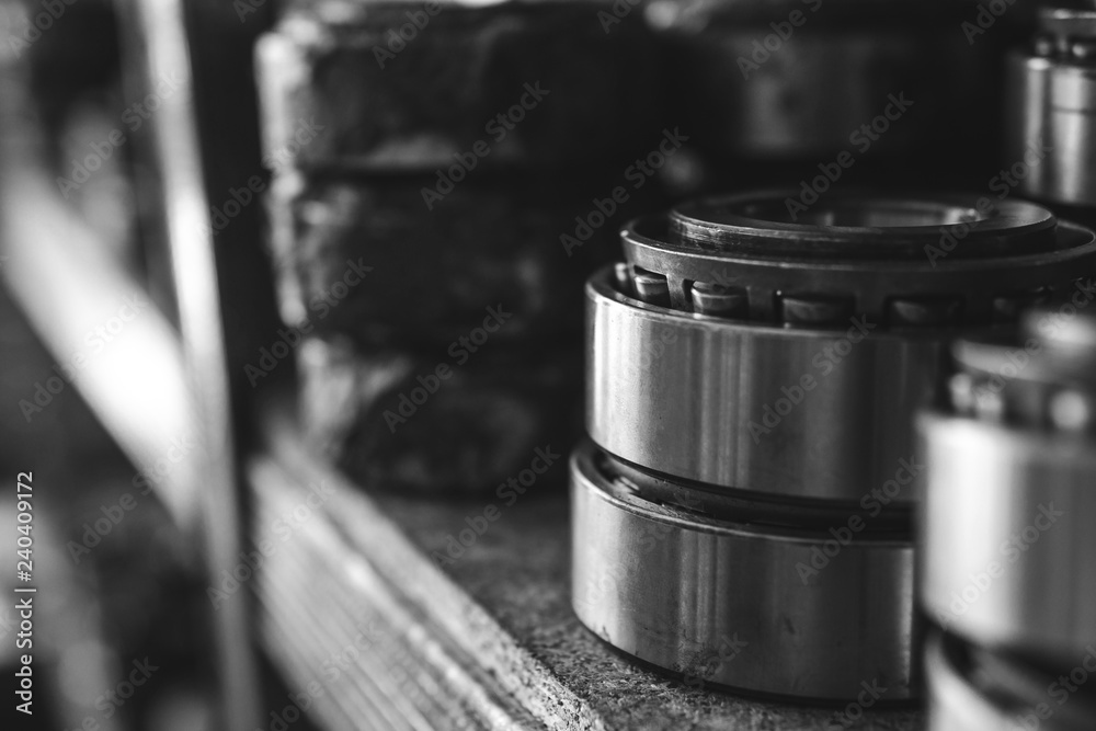 Machinery concept. Set of various gears and ball bearings old and new, BW, black and white Machinery concept. Set of various gears and ball bearings old and new, BW, black and white
